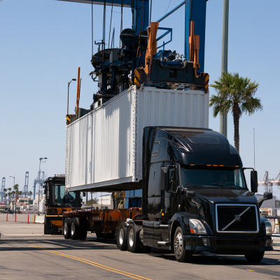 jrm_1cf_a_container_being_mounted_on_a_truck_chassis